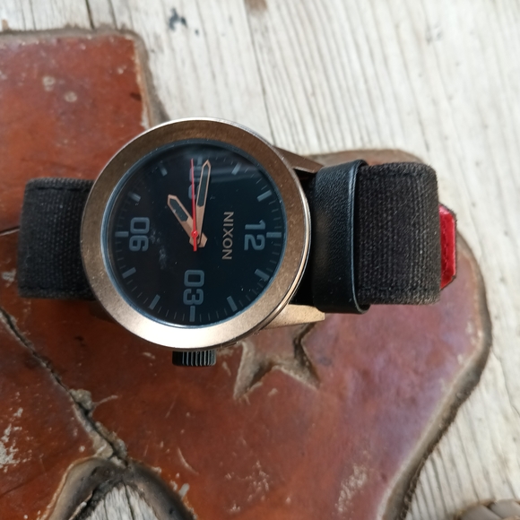 Nixon Black and Gold Watch